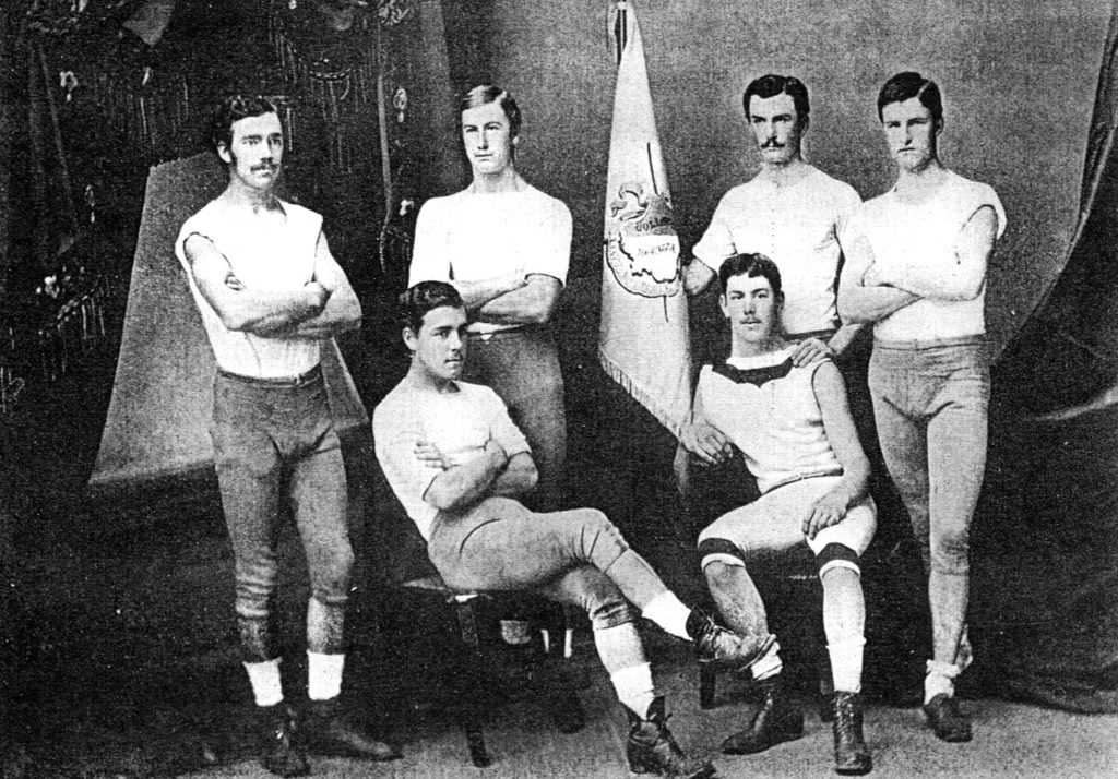 Team photo of the 1874 Heavyweight Men Freshman rowing team