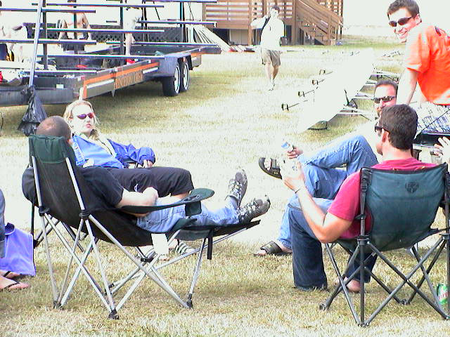 A group of people sitting in a chair