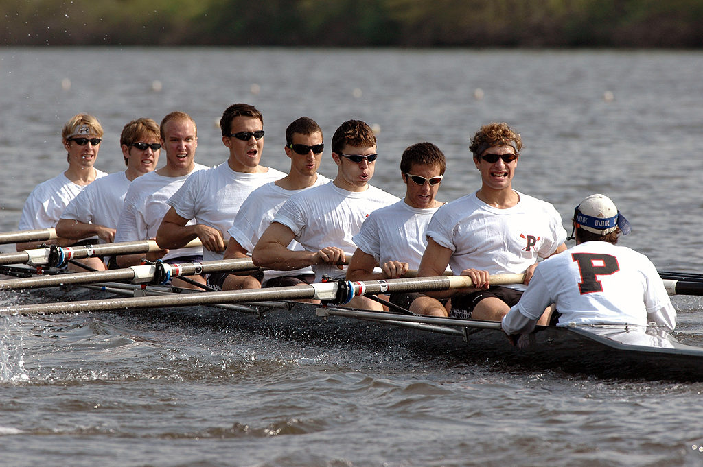 Diarmaid Murtagh et al. rowing a boat in a body of water