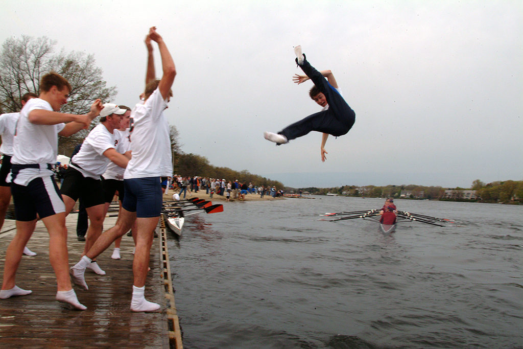 A group of people jumping in the air