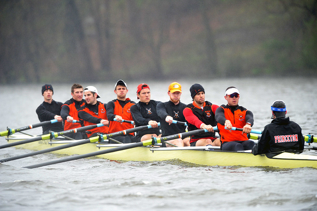 A group of people riding on the back of a boat