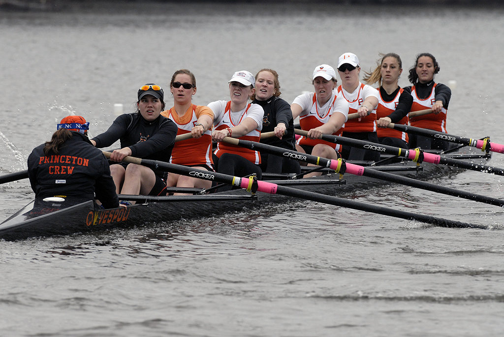 Nadine Kessler et al. rowing a boat in the water