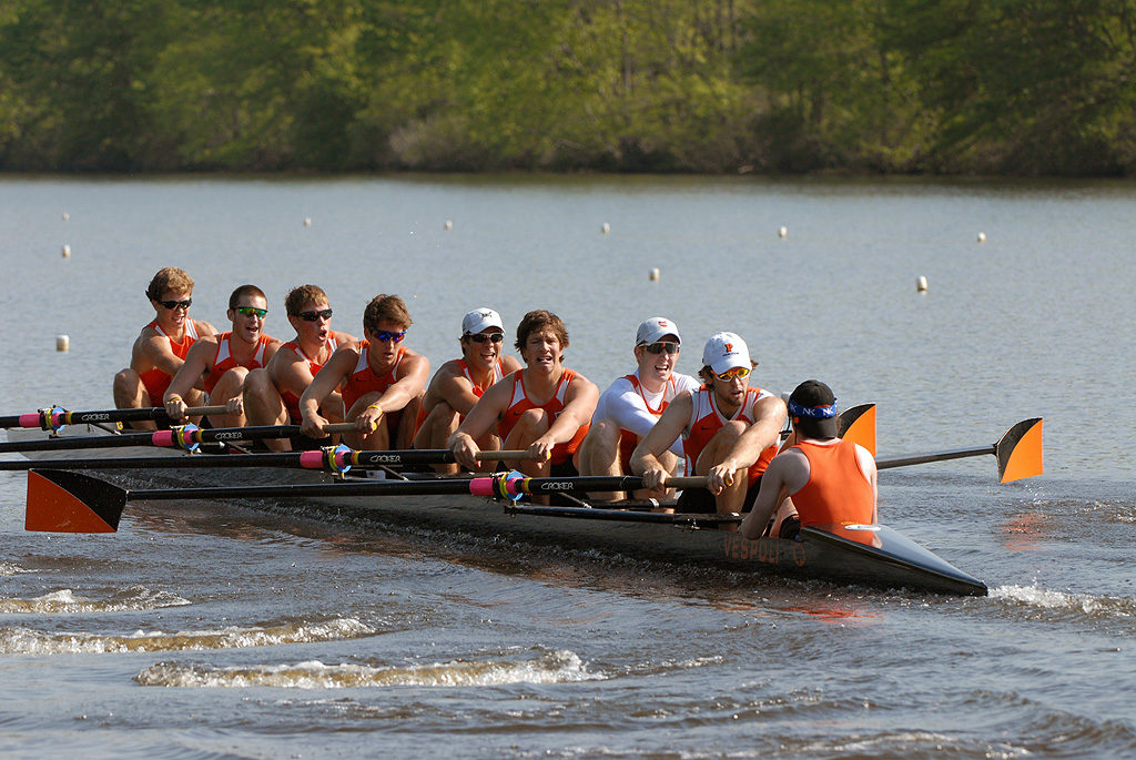 A group of people in a boat on a body of water