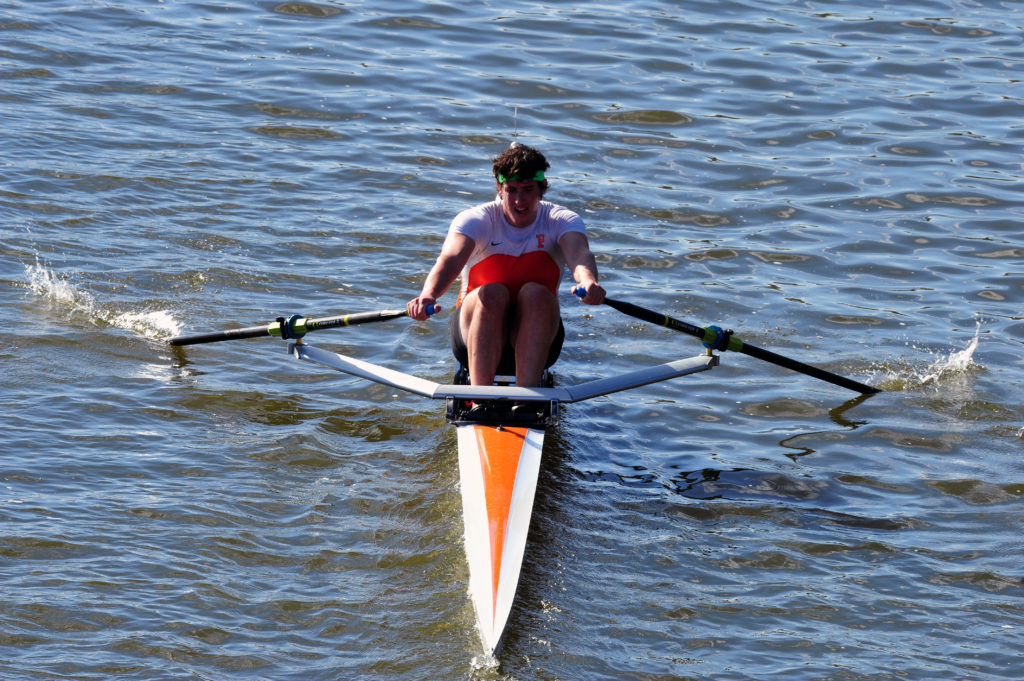 A person rowing a boat in the water