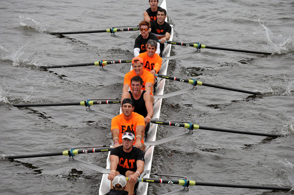 A man rowing a boat in the water