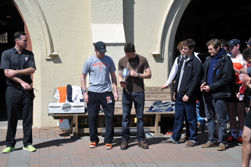 A group of people standing in front of a building