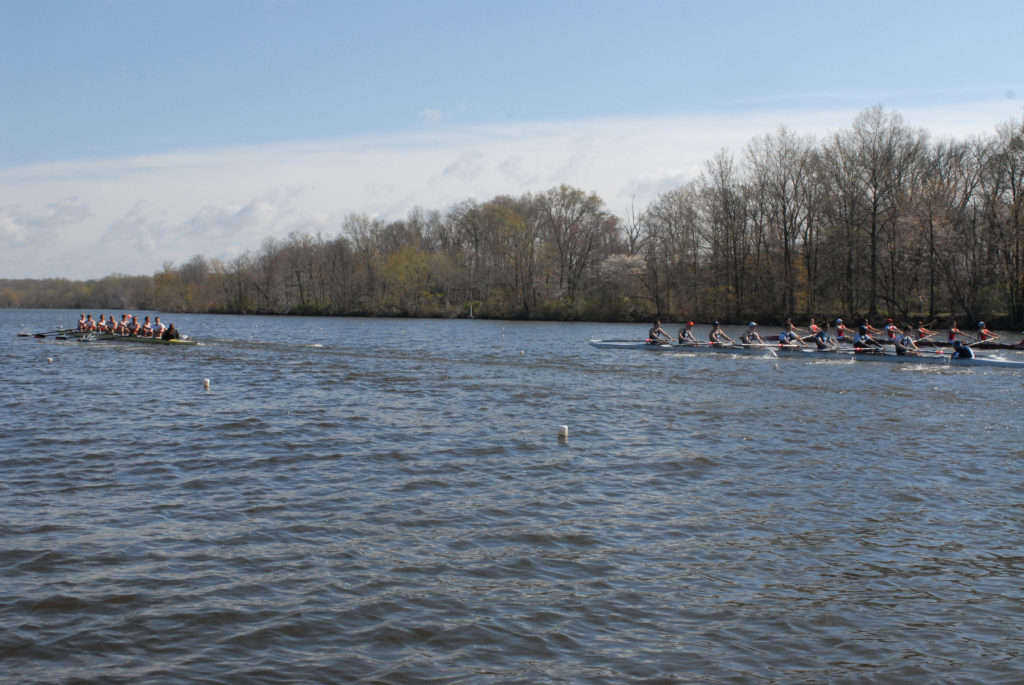 A group of people on a boat in a body of water