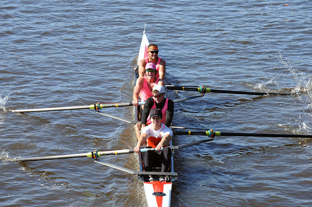 A man rowing a boat in the water