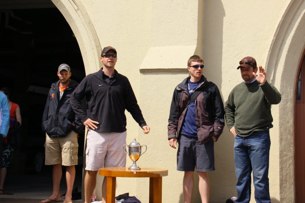 A group of people standing in front of a building