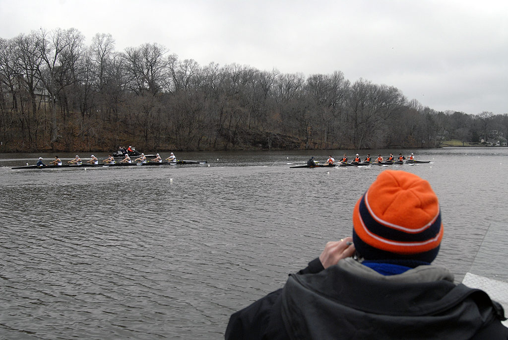 A man in a boat on a body of water