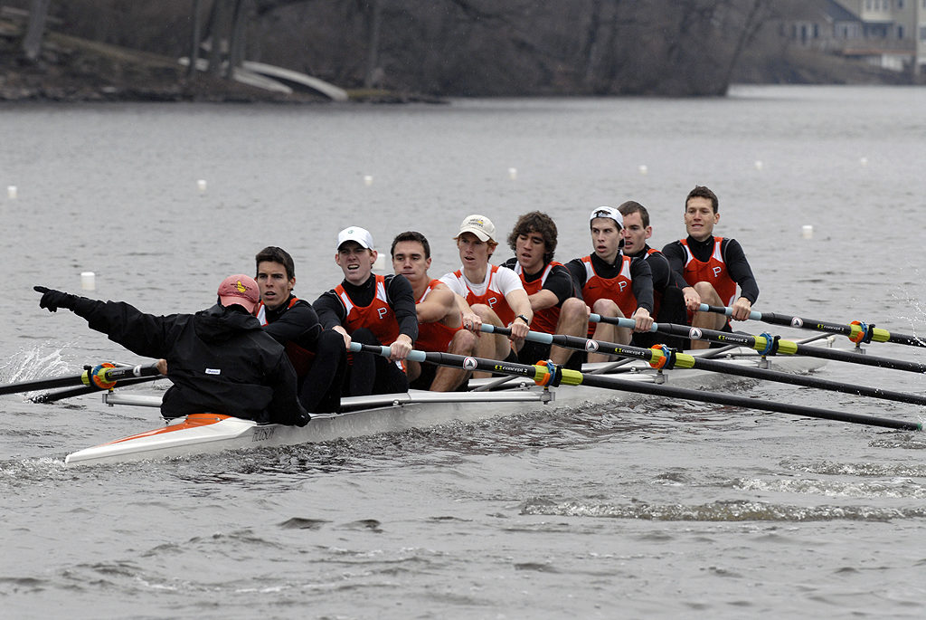 Robin Prendes et al. rowing a boat in the water