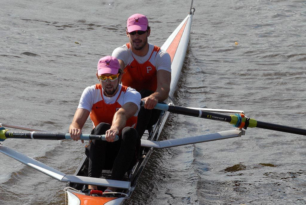 A man rowing a boat in the water