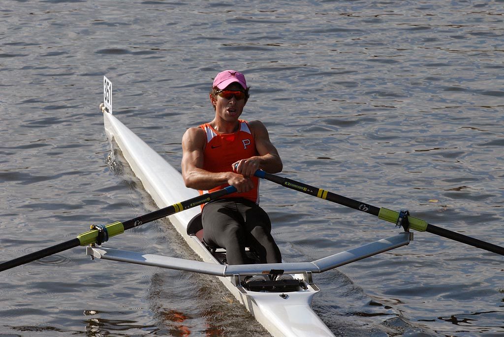 A person rowing a boat in the water