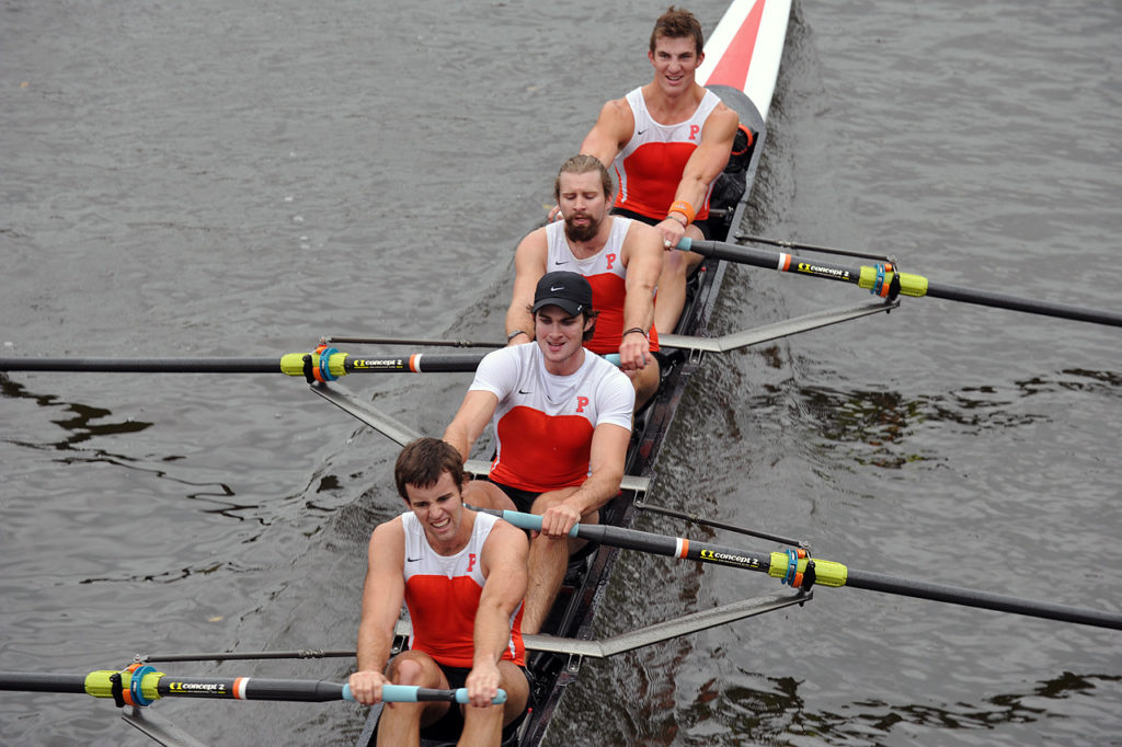 A man rowing a boat in the water