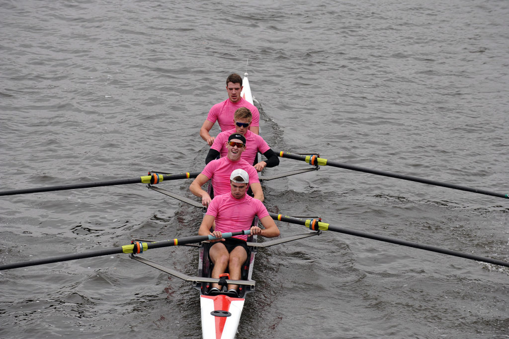 A person rowing a boat in the water