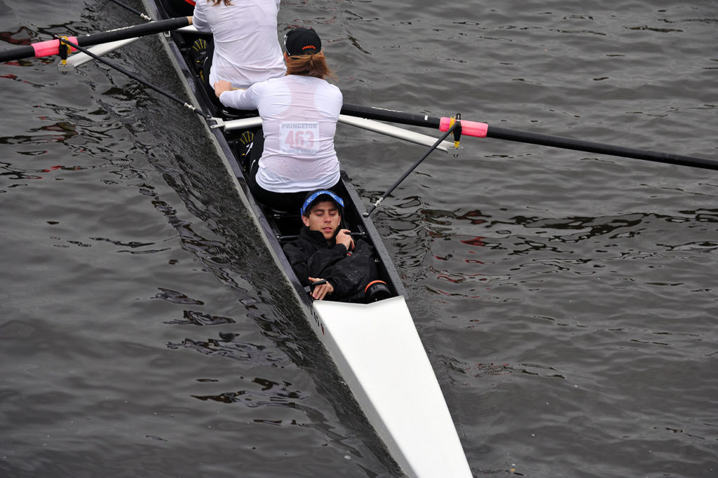 A group of people riding skis on a body of water