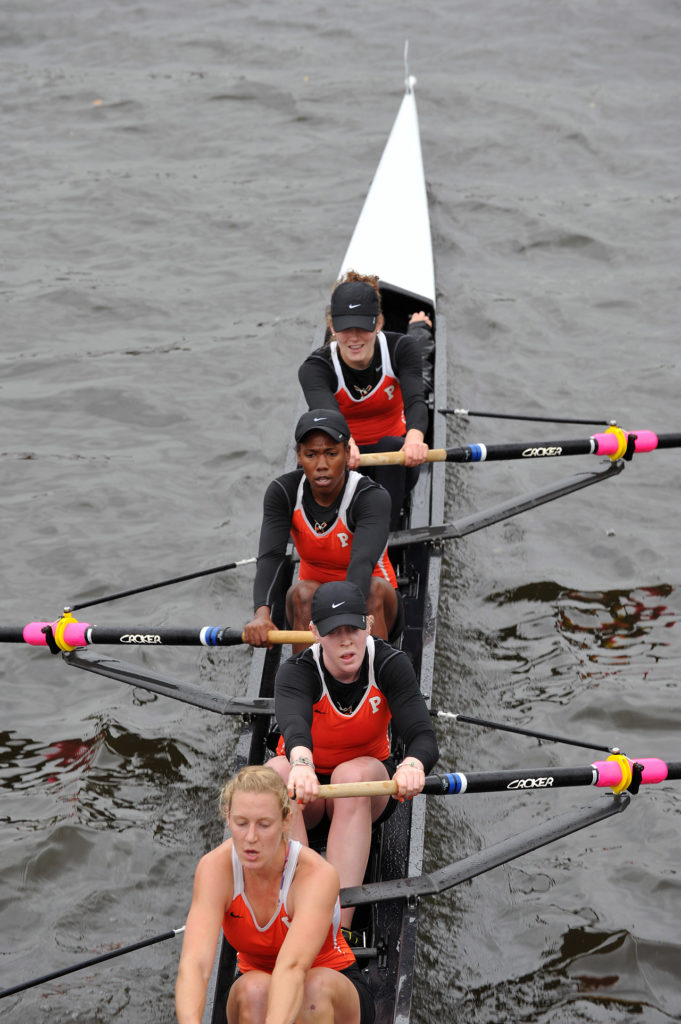 A person rowing a boat in the water