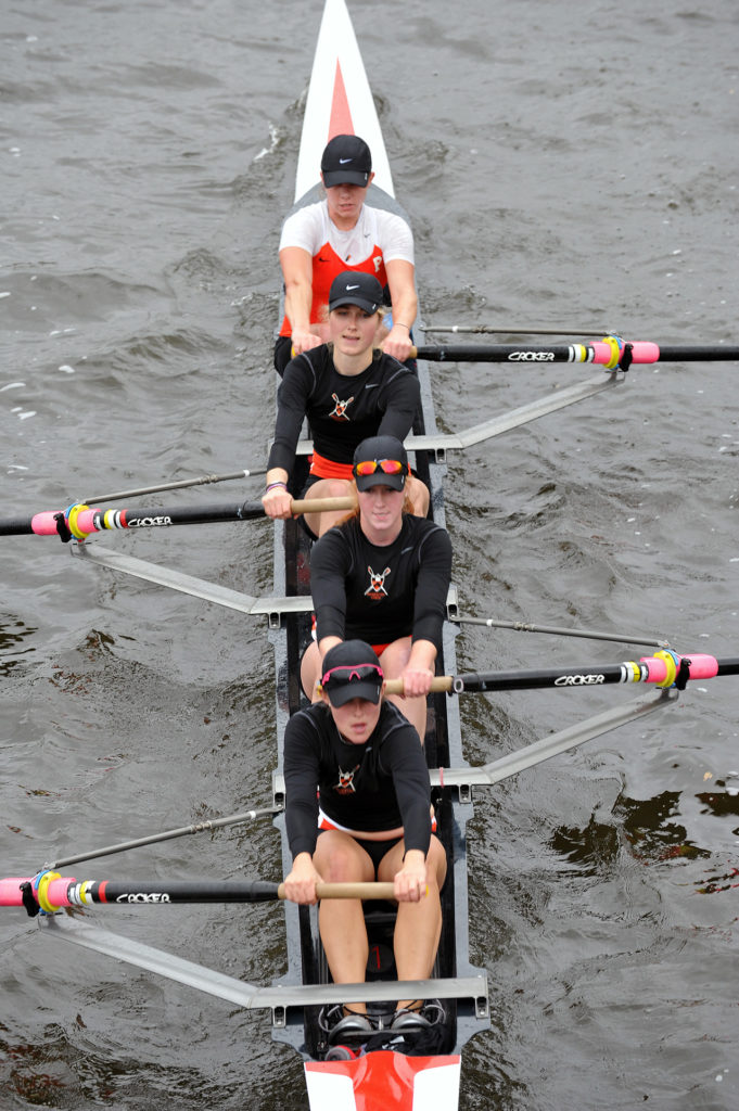 A person rowing a boat in the water