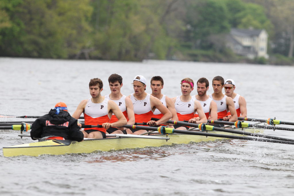 a group of people in a boat on water