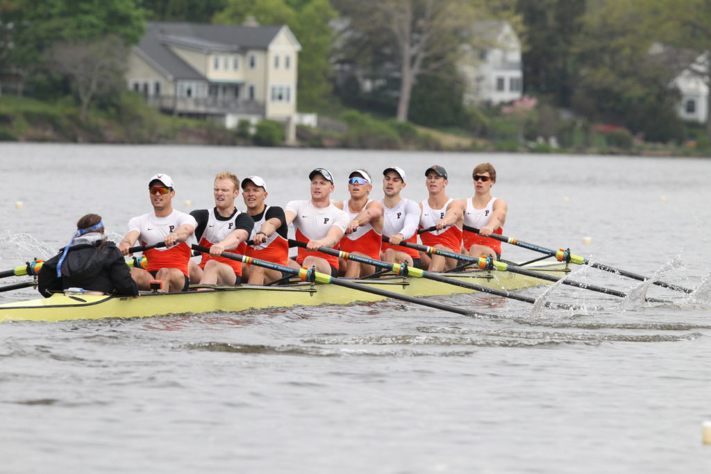 a group of people in a boat on water