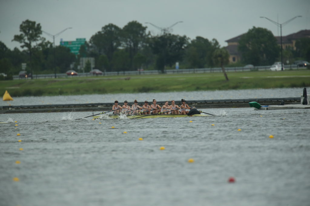 women rowing in a boat