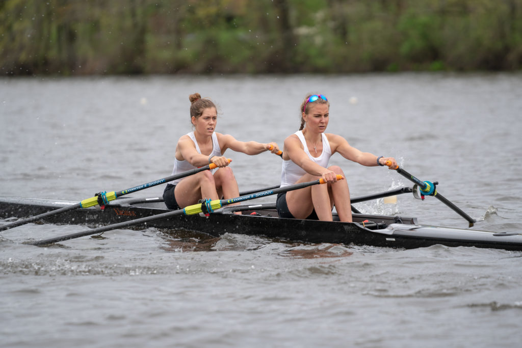 A person rowing a boat in the water