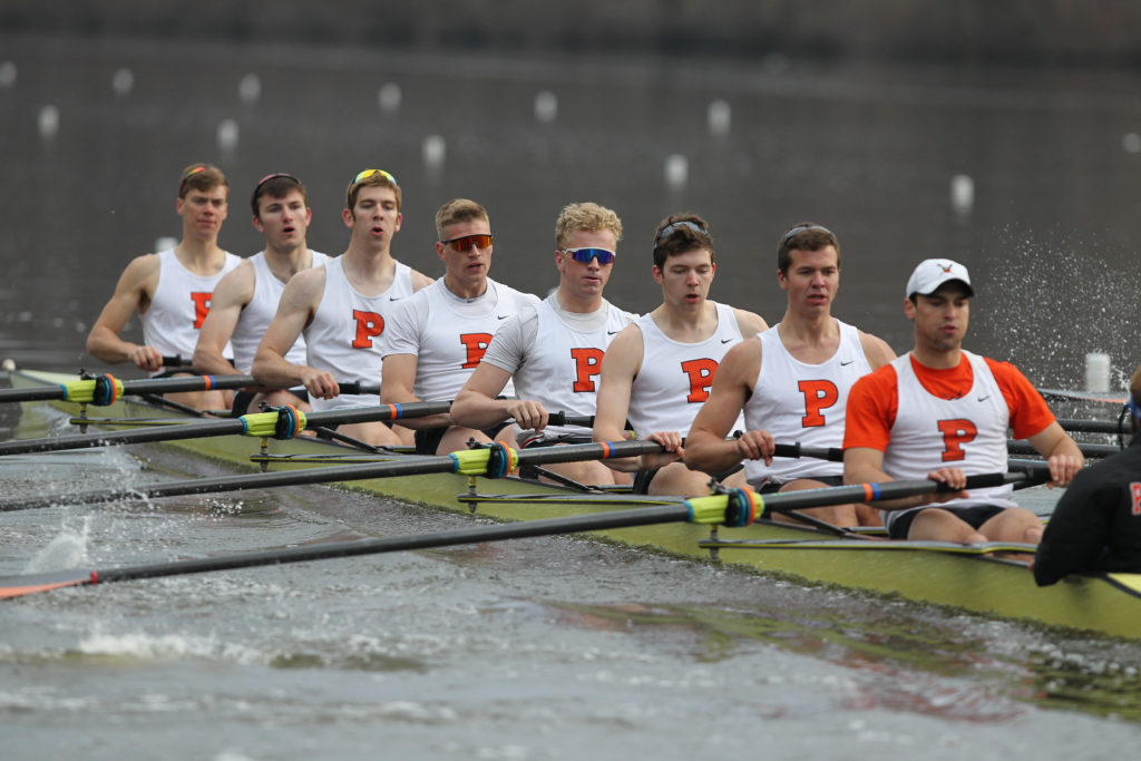 Ken Ograjenšek et al. rowing a boat