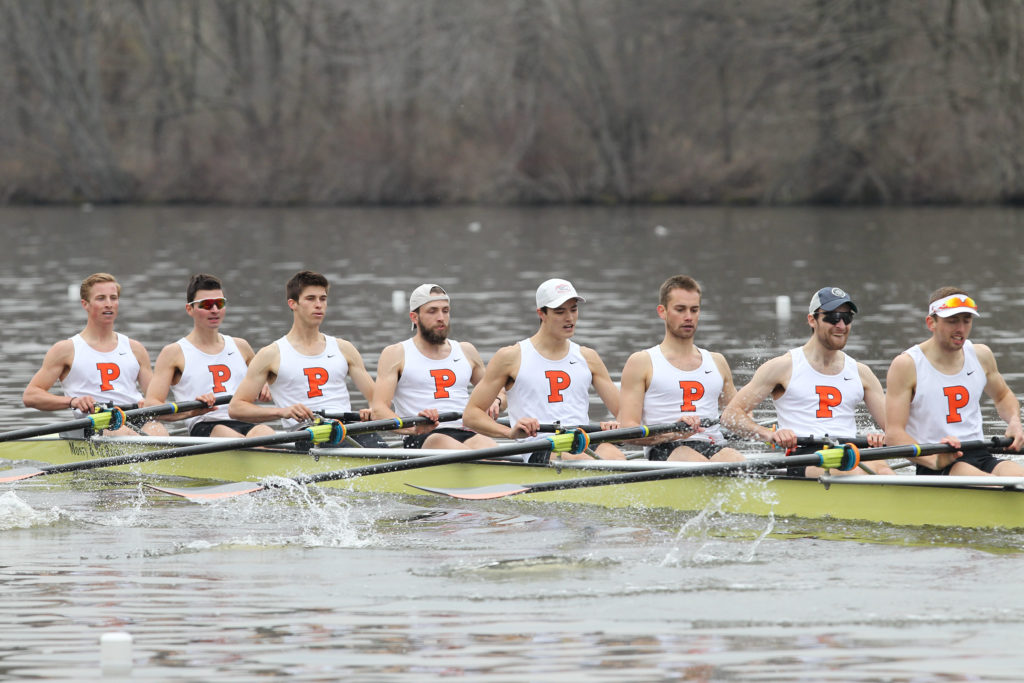 Stephanie Sparks et al. rowing a boat in the water