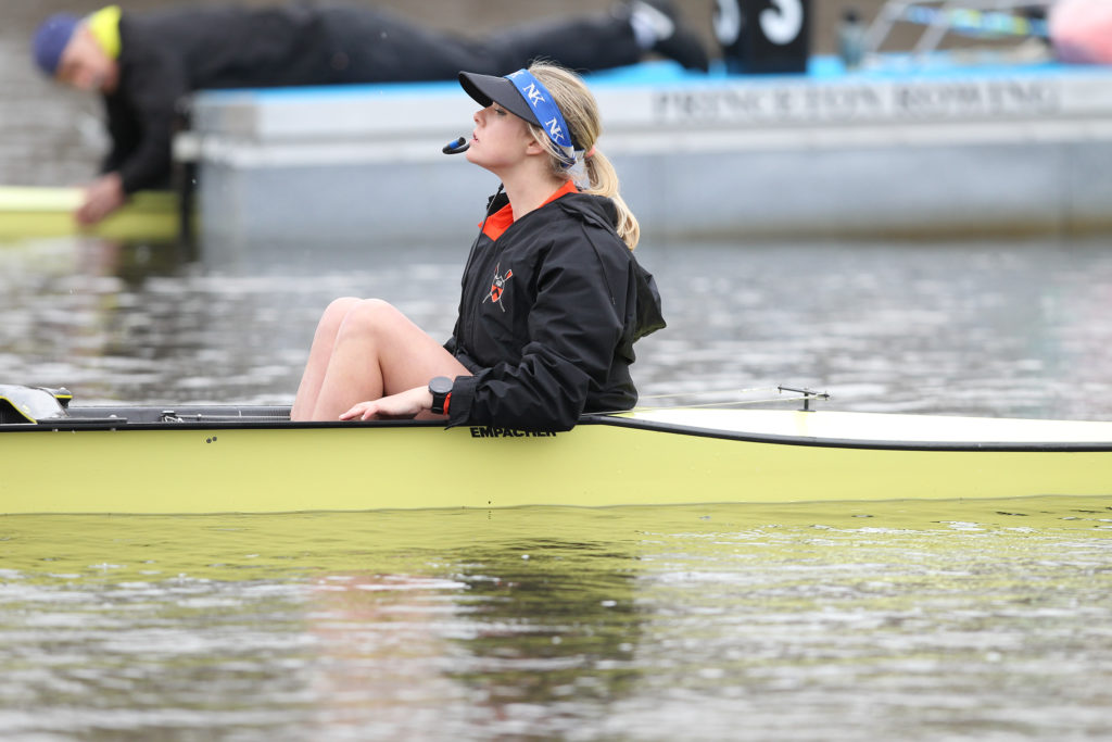 A man rowing a boat in the water